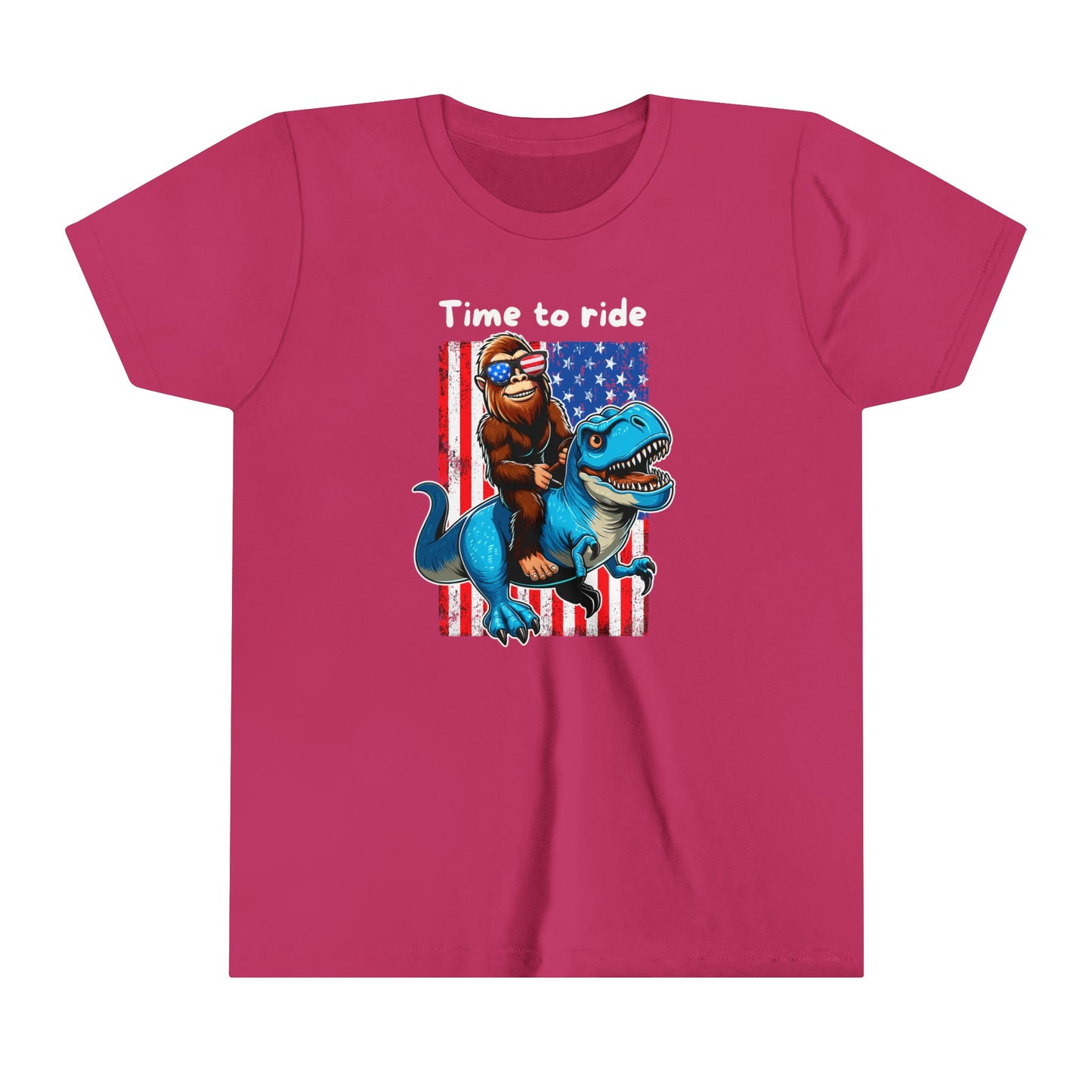 Youth BigFoot on a Dinosaur Shirt | Patriotic Sasquatch Shirt for Kids | Youth Yeti Short Sleeve Tee | Funny BigFoot shirt for boys | Bella Canvas Soft Cotton tee shirt