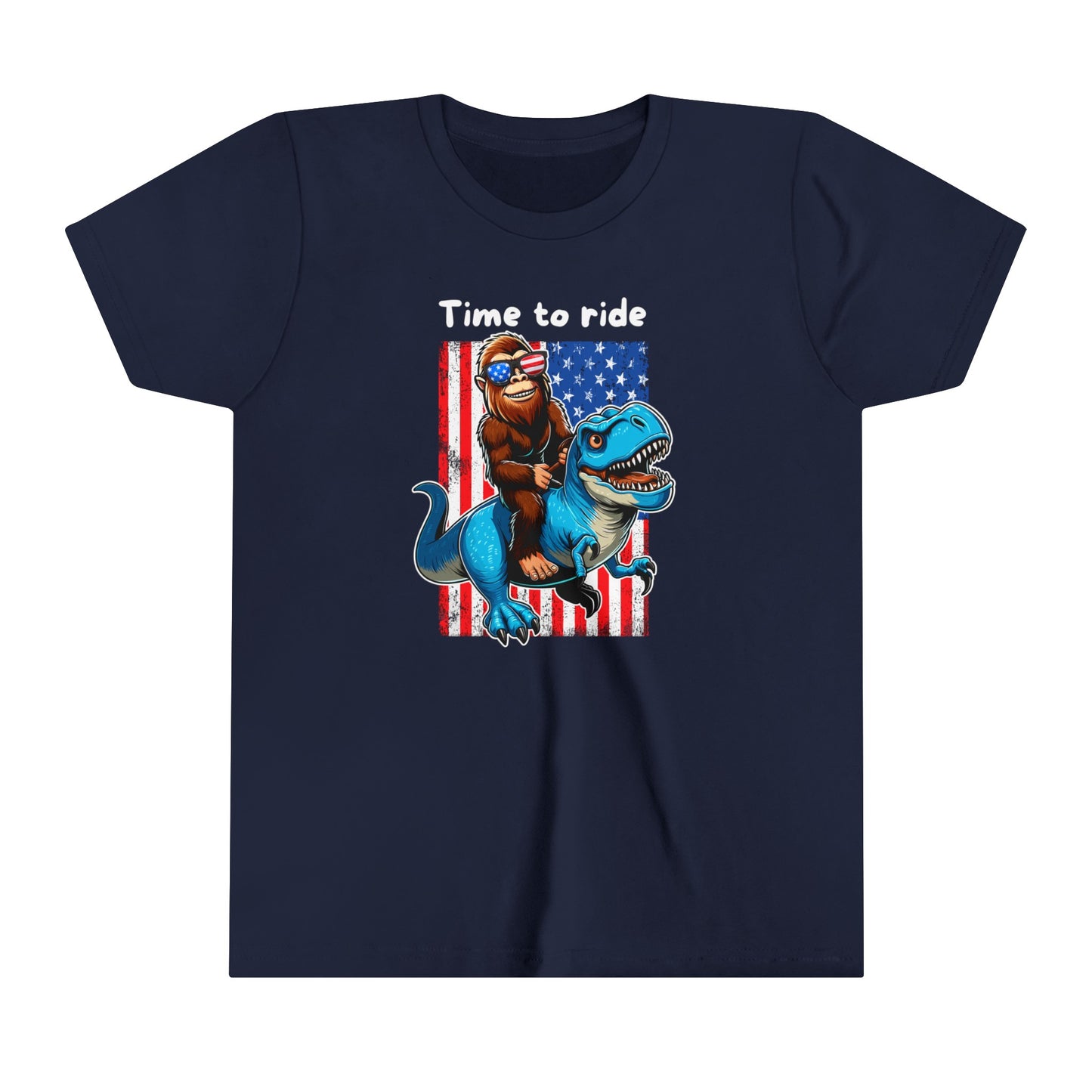 Youth BigFoot on a Dinosaur Shirt | Patriotic Sasquatch Shirt for Kids | Youth Yeti Short Sleeve Tee | Funny BigFoot shirt for boys | Bella Canvas Soft Cotton tee shirt