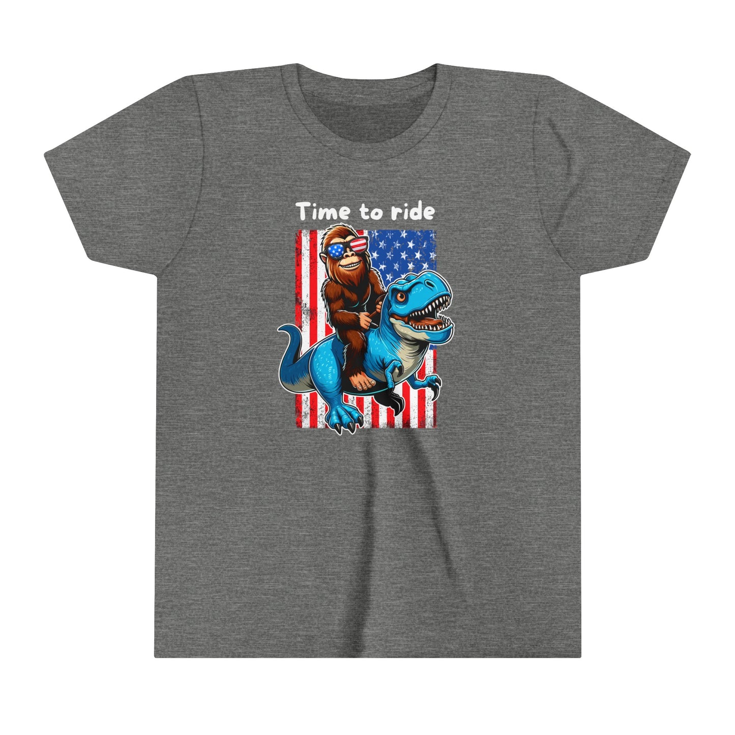 Youth BigFoot on a Dinosaur Shirt | Patriotic Sasquatch Shirt for Kids | Youth Yeti Short Sleeve Tee | Funny BigFoot shirt for boys | Bella Canvas Soft Cotton tee shirt