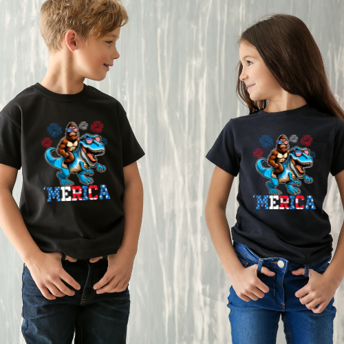 Youth BigFoot on a Dinosaur Shirt | Patriotic Sasquatch Shirt for Kids | Youth Yeti Short Sleeve Tee | Funny BigFoot shirt for boys | Bella Canvas Soft Cotton tee shirt